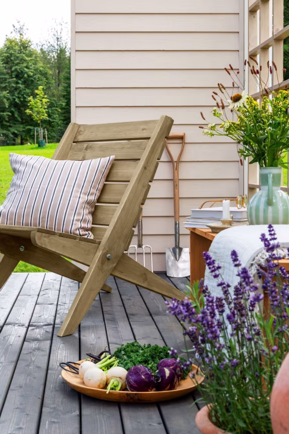 wooden garden chair on decking