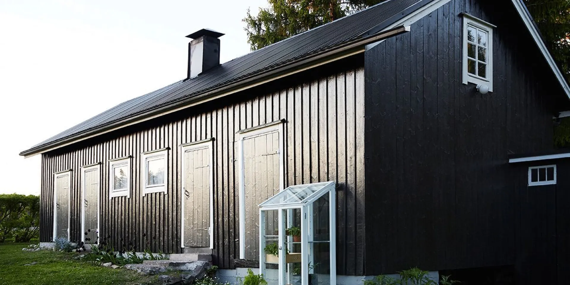 painting barn into black